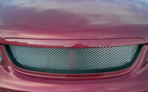 На фото - новая решетка радиатора Киа Спектра, exist-tuning.ru На фото - новая решетка радиатора Киа Спектра, exist-tuning.ru