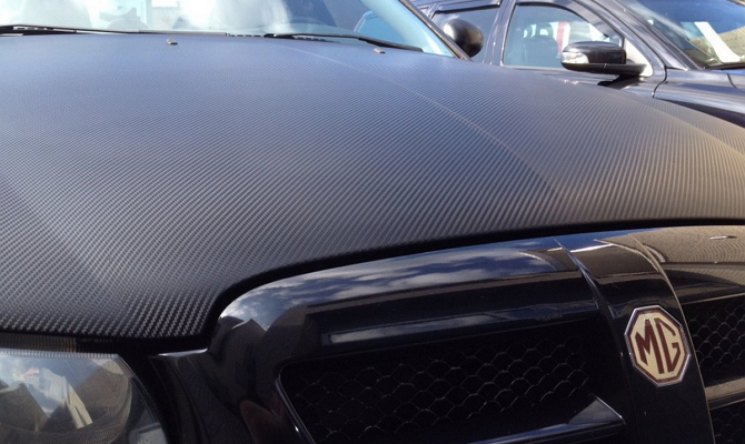 Оклейка авто защитной карбоновой плёнкой Оклейка авто защитной карбоновой плёнкой