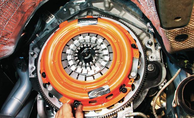 Где расположен маховик Где расположен маховик