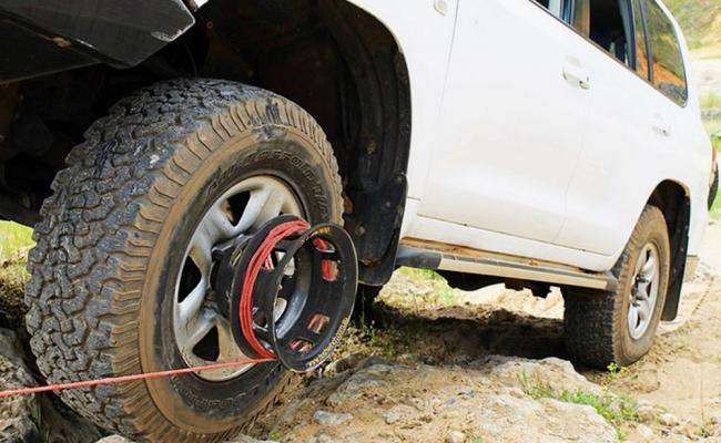 Самовытаскиватель машины на колесе Лебедка на колесе автомобиля